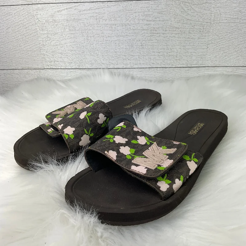 Men's sandals with a buckle closureSandals Designer By Michael Kors In Brown