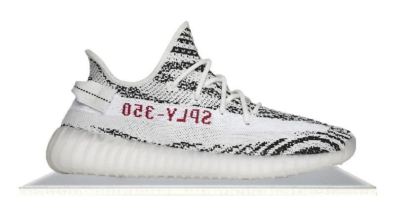 Men's navy blue suede sneakers with gold - toned eyeletsYeezy Boost 350 V2 Zebra