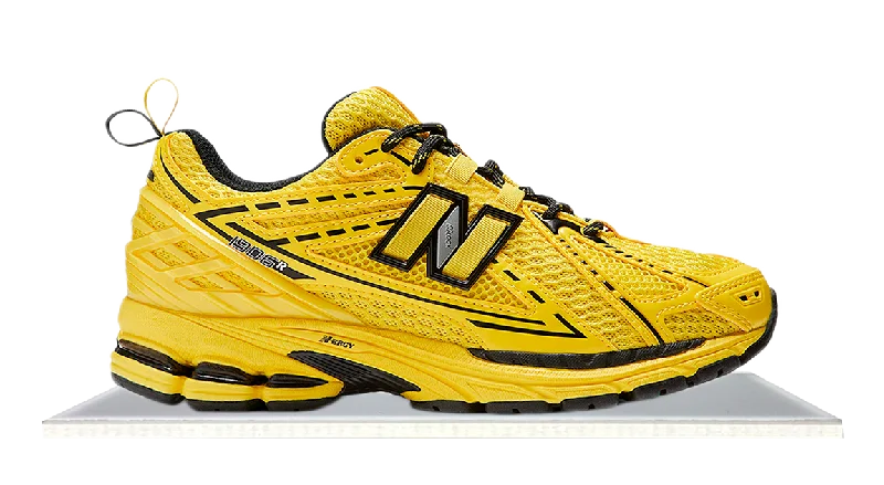 Men's retro - style sneakers inspired by the 80sNew Balance 1906R GANNI Blazing Yellow