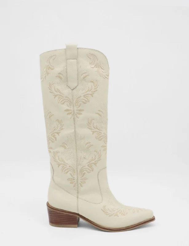 Men's western boots with a concho - studded strap and a pointed toePRE-ORDER (Ships by 11/25/24)Jolene western cowboy boots in off white leather women's shoes Men's western boots with a concho - studded strap and a pointed toePRE-ORDER (Ships by 11/25/24)Jolene western cowboy boots in off white leather women's shoes
