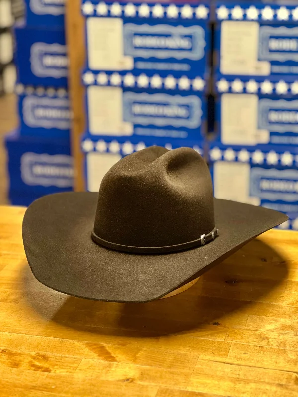 Men's western boots with a concho - studded strap and a pointed toeRodeo King | 7X Top Hand Chocolate Felt Cowboy Hat Men's western boots with a concho - studded strap and a pointed toeRodeo King | 7X Top Hand Chocolate Felt Cowboy Hat